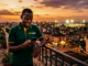 Top Tips — Value Selections for CAF Return Fixtures Man checking phone at sunset